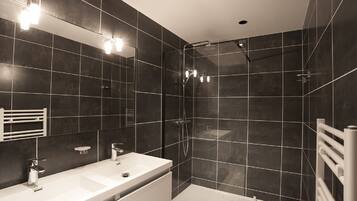 Shower, hair dryer, soap, shampoo