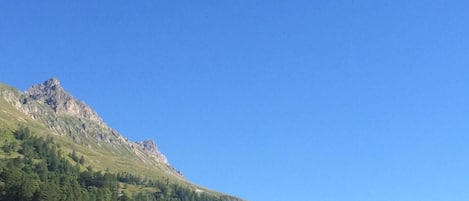 A mountainous landscape with a clear sky.