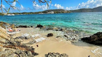 On the beach, sun loungers, beach towels