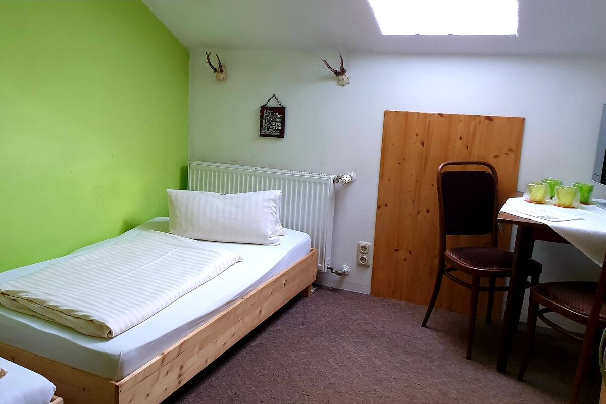 Economy Room (Quadruple) | Desk, free WiFi, bed sheets