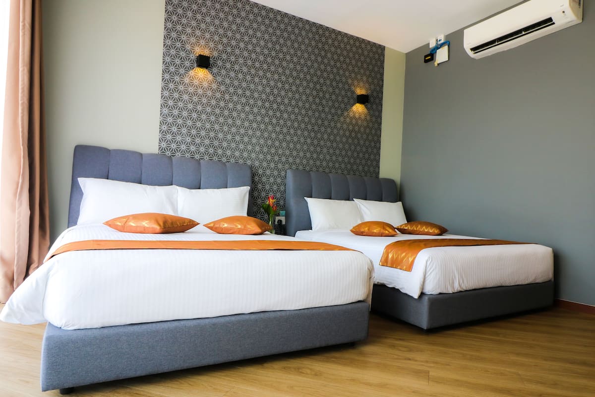 deluxe studio, 2 queen beds | minibar, in-room safe, desk, laptop workspace