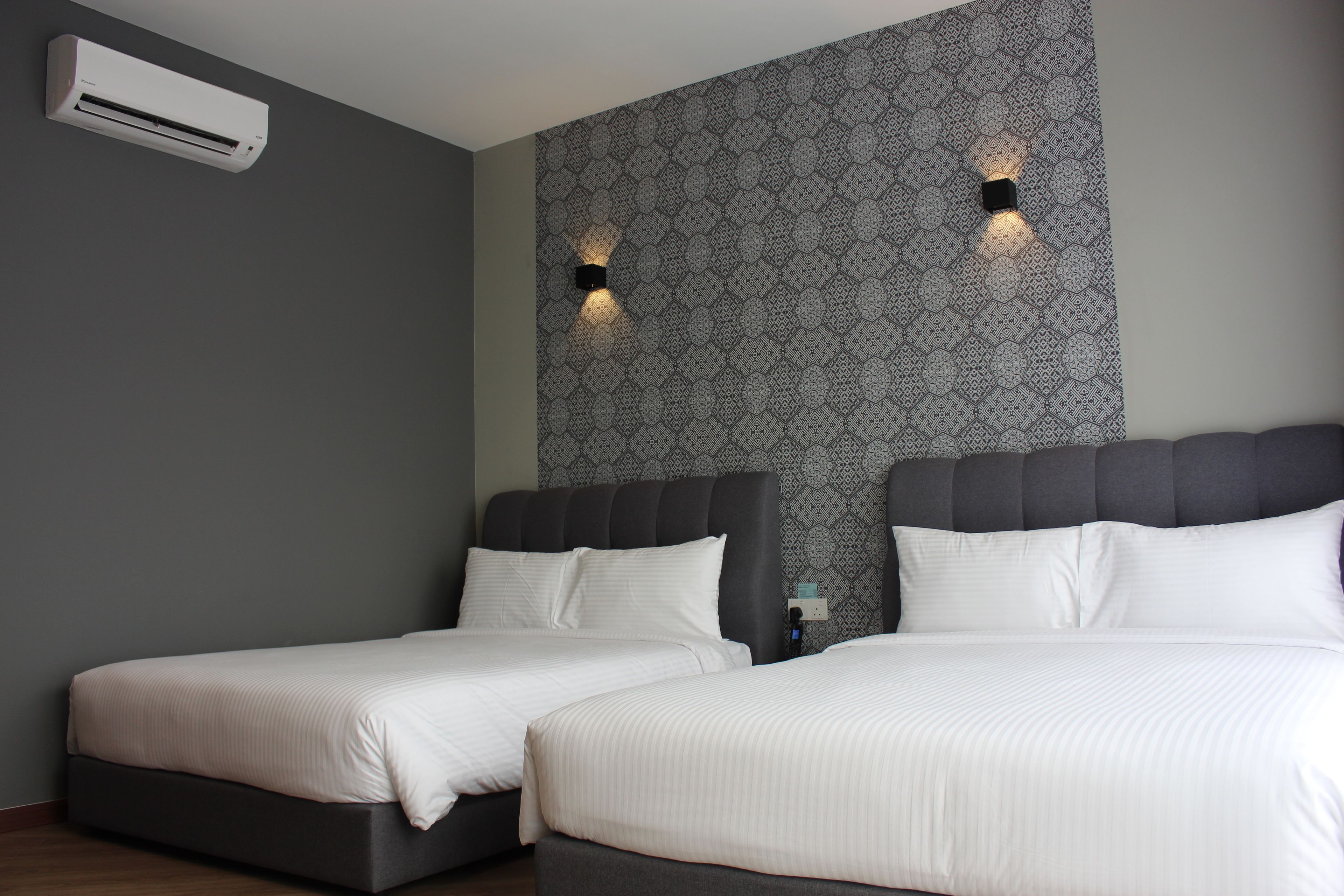 deluxe studio, 2 queen beds | minibar, in-room safe, desk, laptop workspace