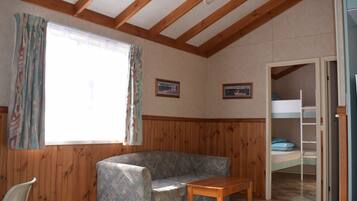 Family Cabin | Living area | Flat-screen TV