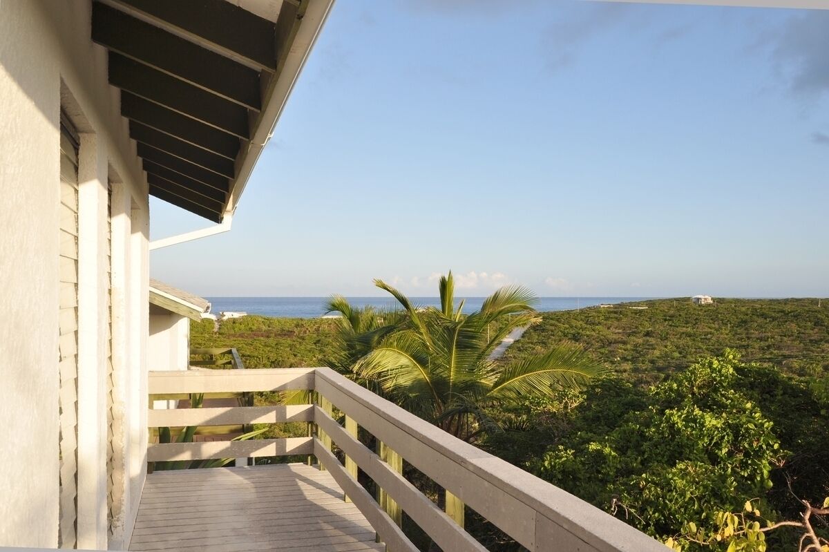 Balcony overlooking beautiful foliage and views to the ocean