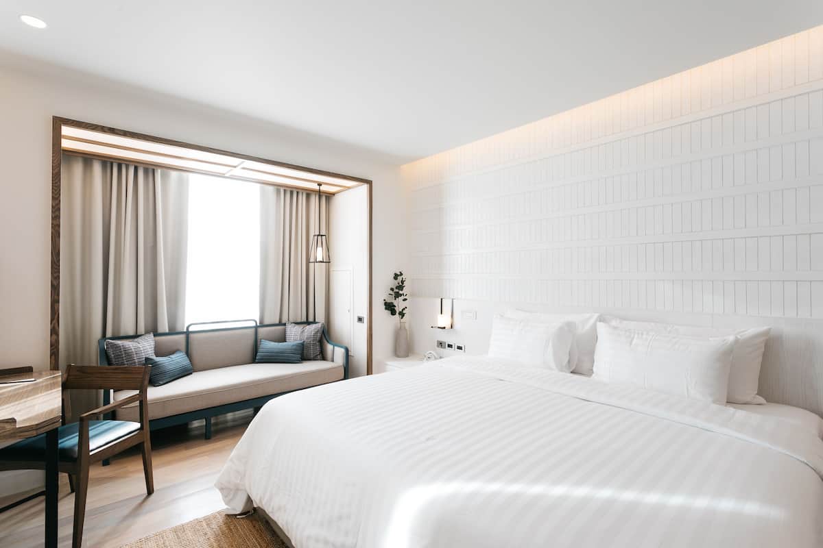 Serene White Double Room (24 Hours Use of Room) | Free minibar, in-room safe, desk, laptop workspace
