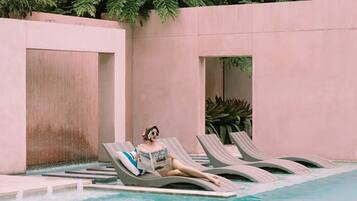 Outdoor pool, open 6:00 AM to 11:00 PM, free cabanas, pool umbrellas