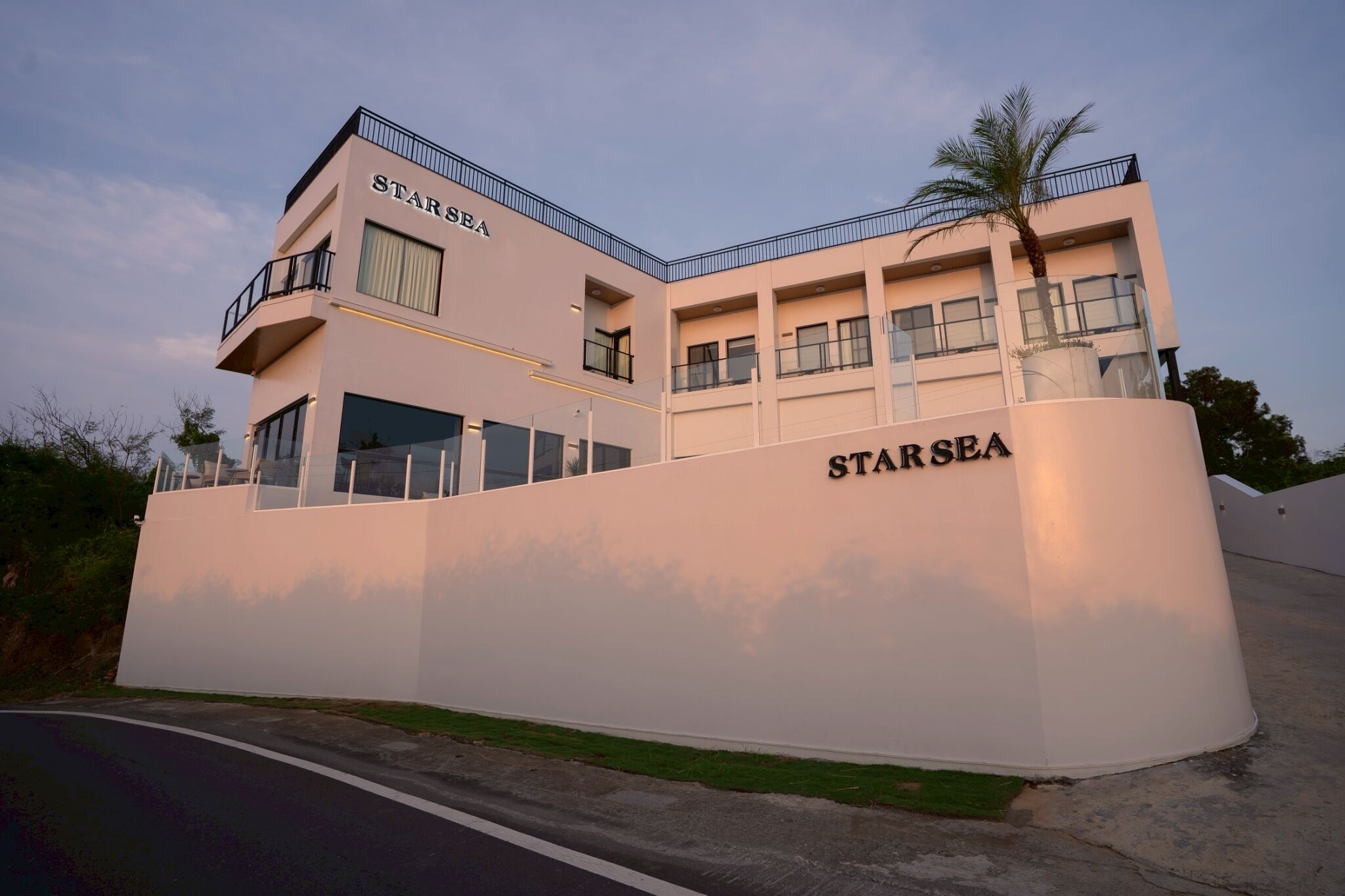 A modern building with the name "STARSEA" on the facade.
