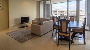 The Quays | Living room | Flat-screen TV - Beach Apartments (Durban)