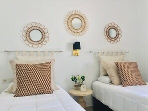 2 habitaciones, tabla de planchar con plancha, wifi y ropa de cama 