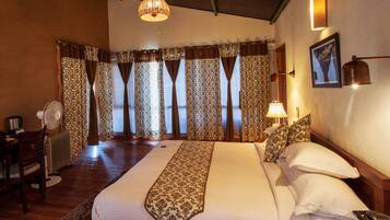 Desk, blackout curtains, rollaway beds, bed sheets