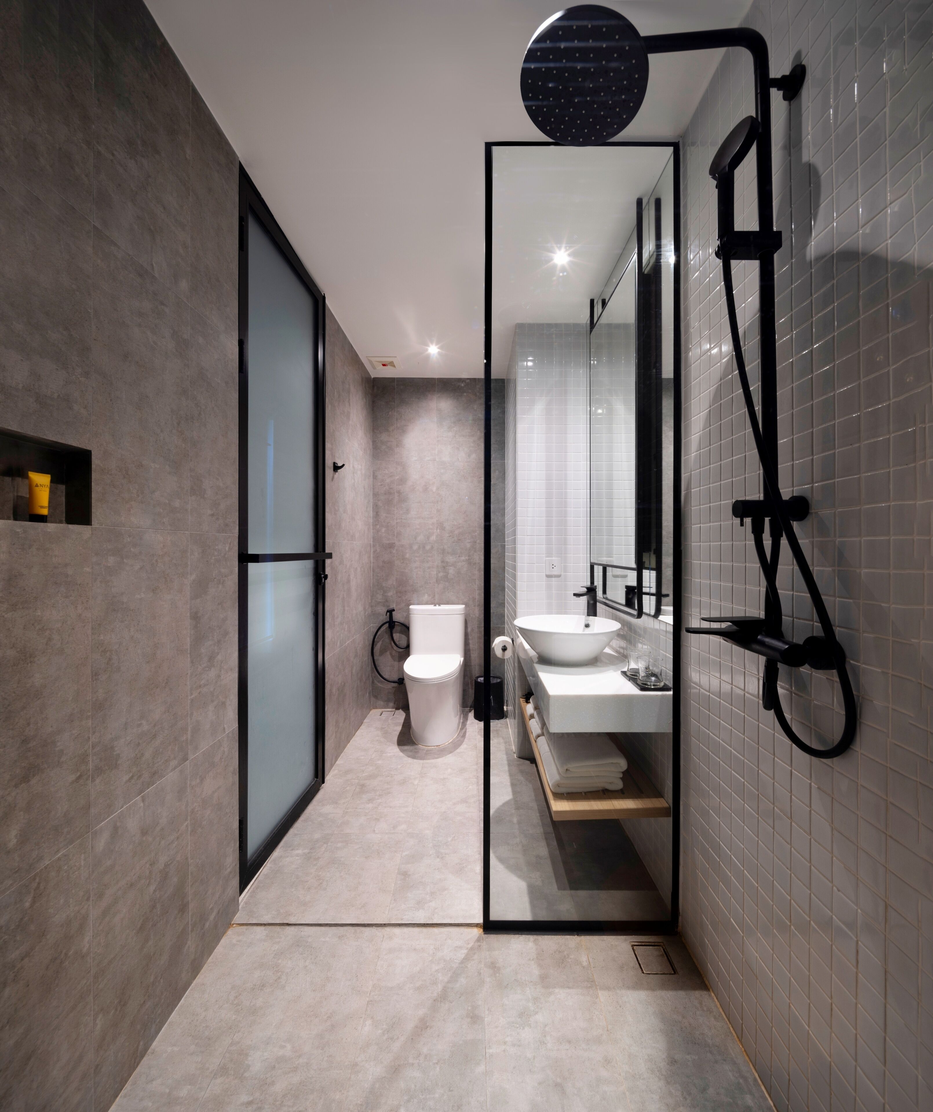 deluxe plus king room | bathroom | shower, jetted bath, rainfall showerhead, free toiletries