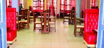 Breakfast, lunch, dinner served; local cuisine 