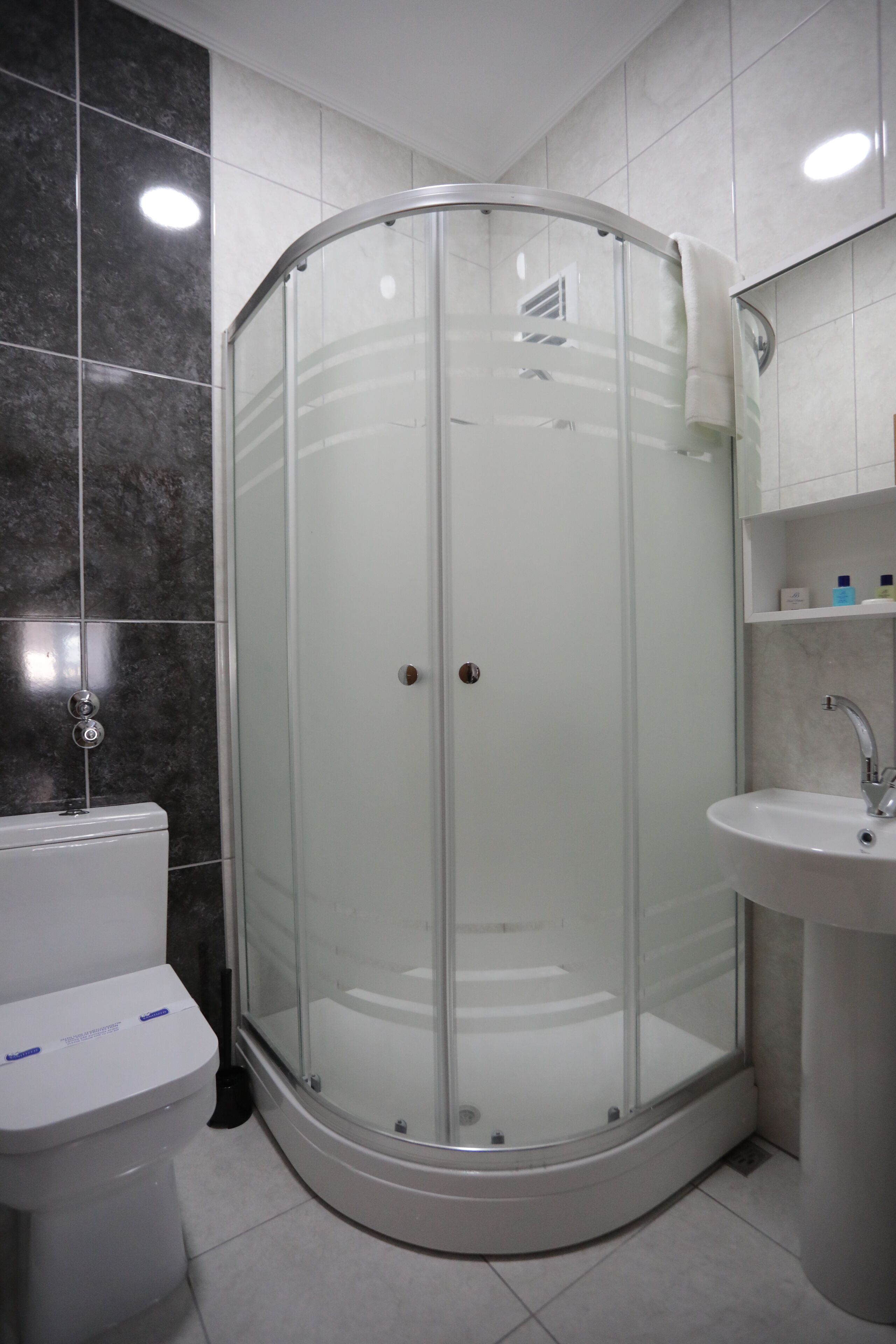 shower, free toiletries, hair dryer, slippers