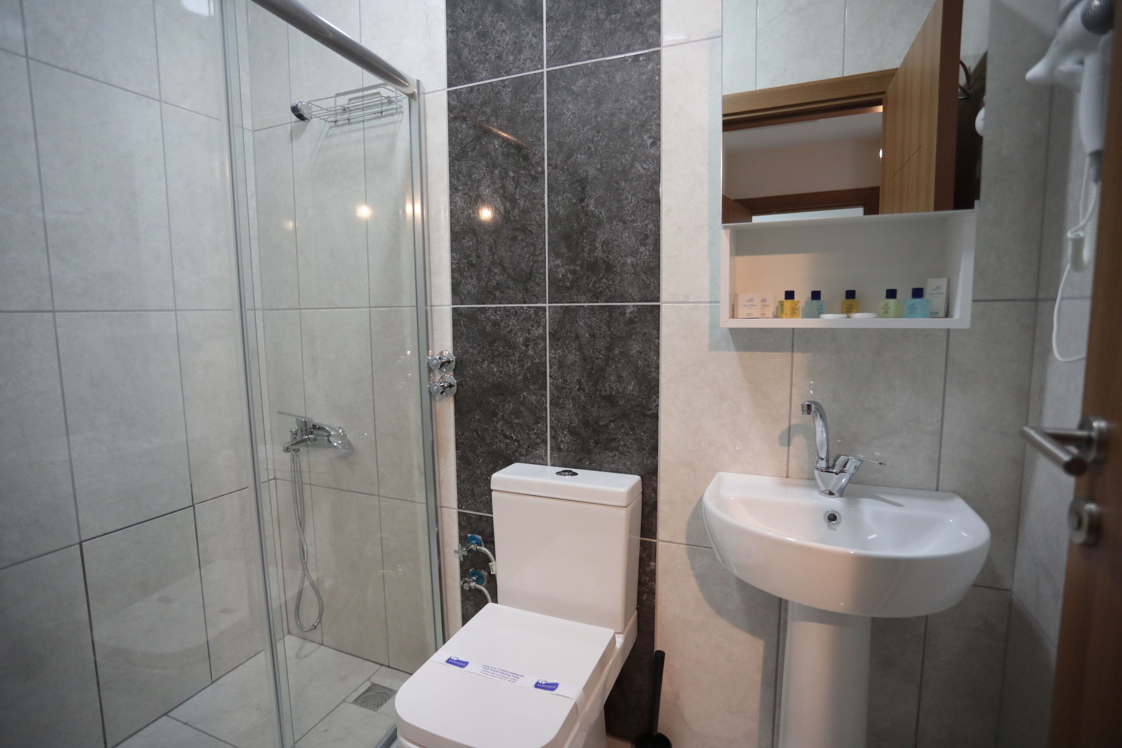 family triple room | bathroom | shower, free toiletries, hair dryer, slippers