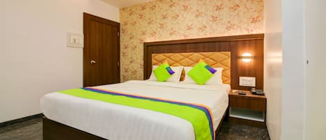 Quarto standard | Escrivaninha, Wi-Fi de cortesia, roupa de cama