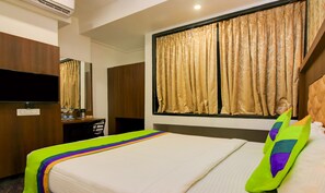Deluxe Room | Desk, free WiFi, bed sheets - Treebo Arvind Residency (Thane)