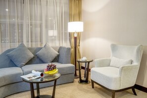 Chambre Double Deluxe | Coin séjour