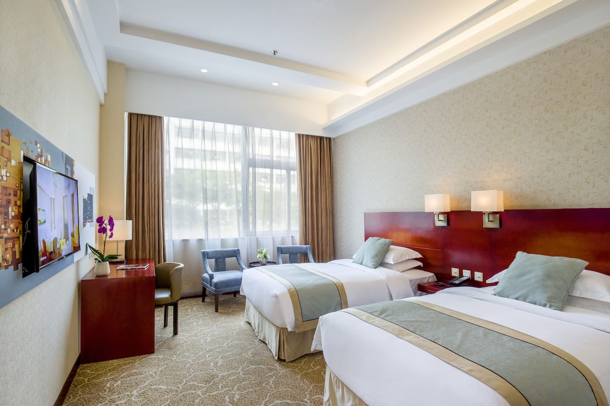Superior Twin Room | Minibar, in-room safe, desk, blackout curtains