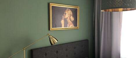 2 bedrooms, blackout drapes, soundproofing, iron/ironing board