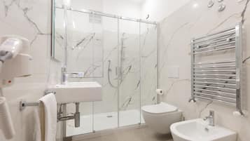Shower, free toiletries, hair dryer, bidet