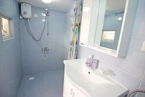 Shower, slippers, towels