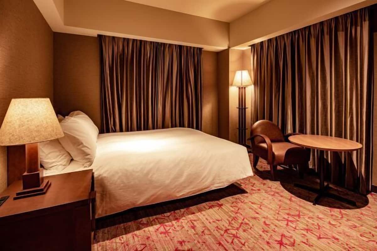 Een kluis op de kamer, verduisterende gordijnen, gratis wifi, beddengoed