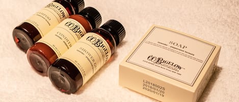 Four bottles of Bigelow soap and a box of the same product.