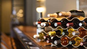 A wine rack with various bottles.