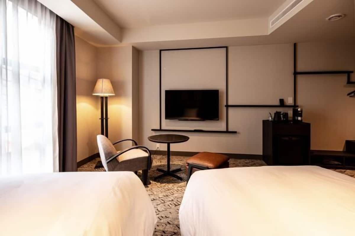 Een kluis op de kamer, verduisterende gordijnen, gratis wifi, beddengoed