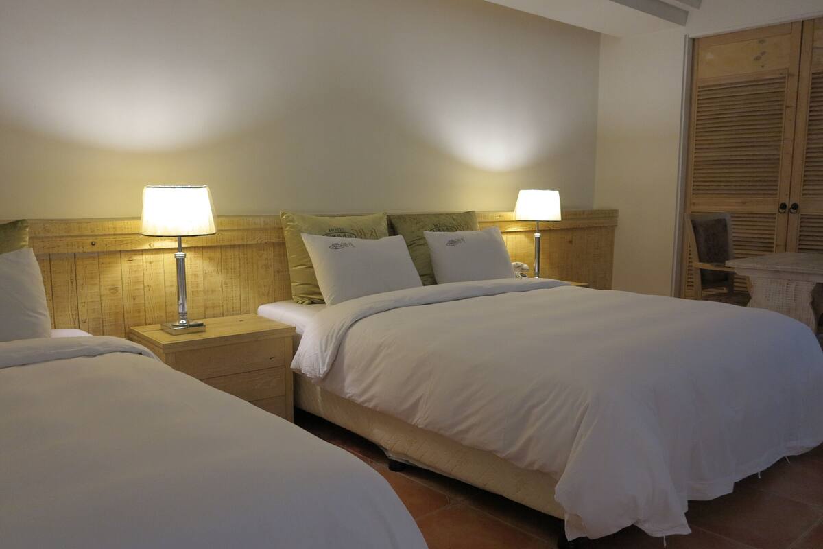 Premium bedding, desk, blackout curtains, soundproofing