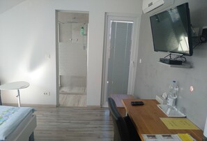 Double Room, Private Bathroom | Living area | Flat-screen TV