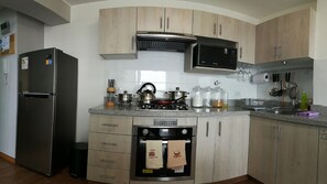 Fridge, microwave, coffee/tea maker, electric kettle