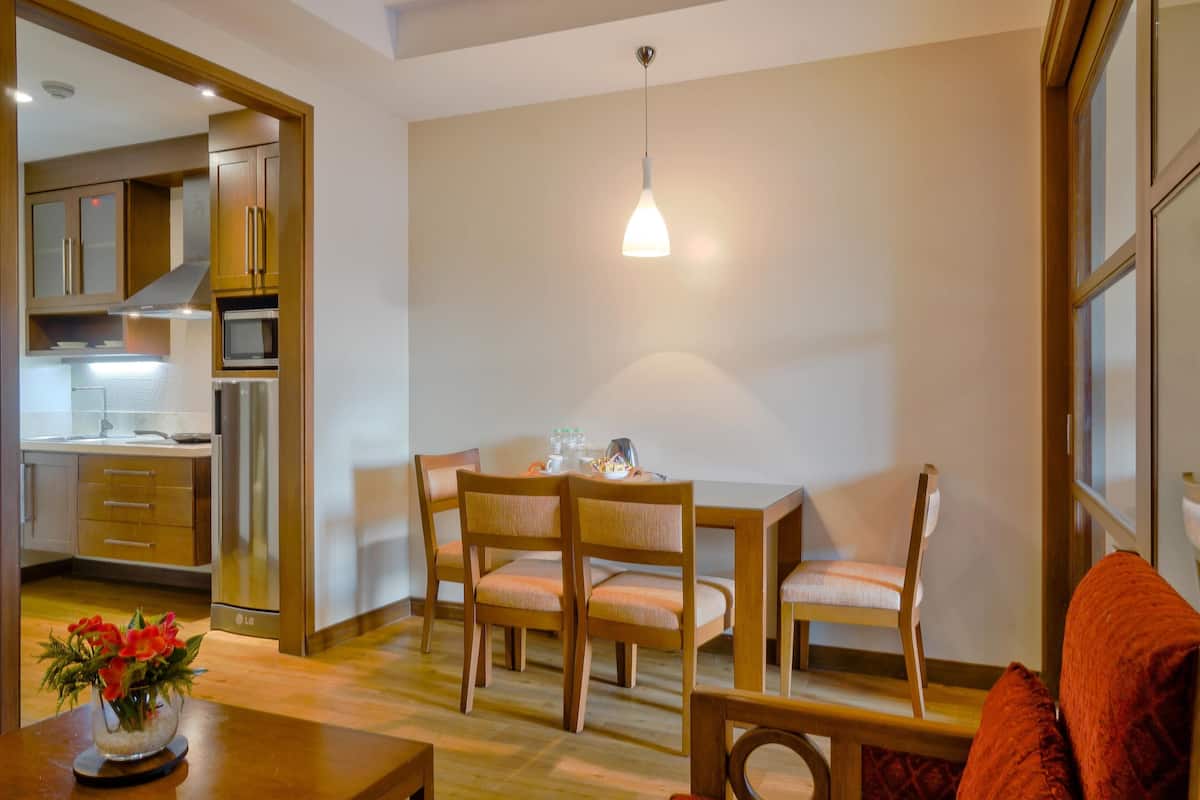 apartelle | living area | flat-screen tv