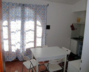 Apartment, 2 Bedrooms | Private kitchen | Full-sized fridge, stovetop, coffee/tea maker, cookware/dishes/utensils
