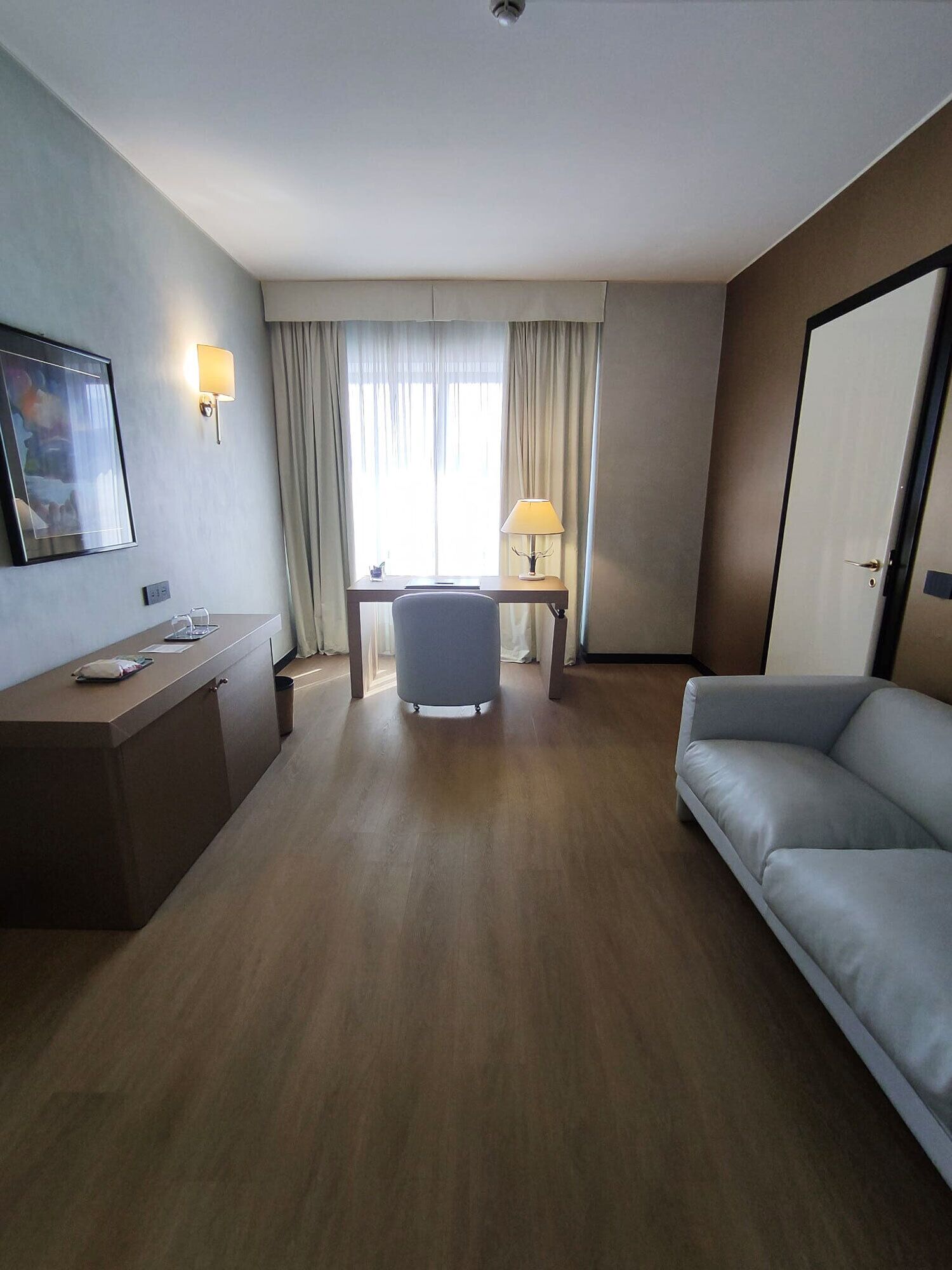 junior suite | living area | flat-screen tv