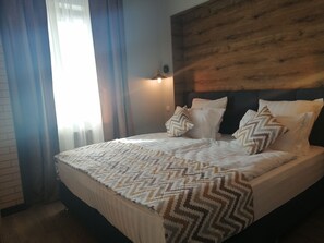 Deluxe Studio Suite, Mountain View | Premium bedding, minibar, in-room safe, individually decorated - Irbis Inn (Almaty)