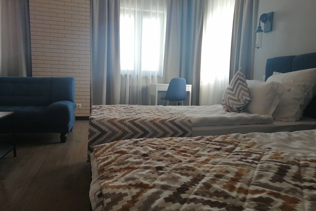 Chambre supérieure double ou avec lits jumeaux | Literie de qualité, minibar, coffre-fort, bureau