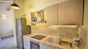 Apartemen, 2 kamar tidur (6 Prs) | Dapur pribadi | Mesin pembuat kopi/teh, lemari es besar, dan kompor