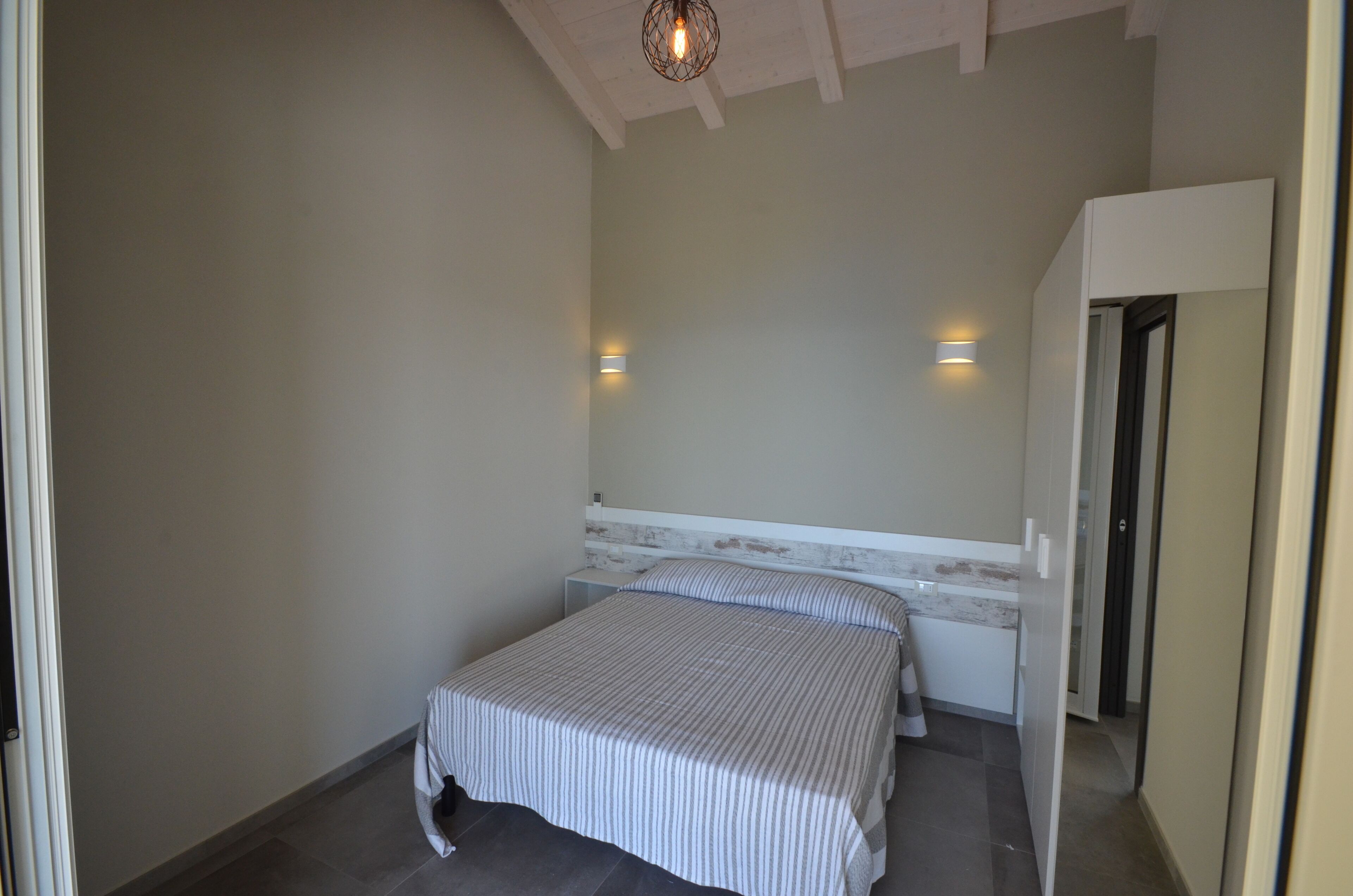 Apartamento, 2 quartos (6 Prs) | 2 quartos, escrivaninha, Wi-Fi de cortesia, roupa de cama