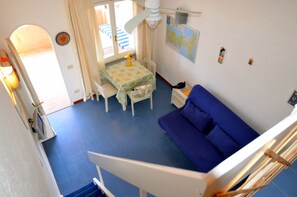 Appartement, 1 chambre | Salle de séjour | Télévision à écran plat