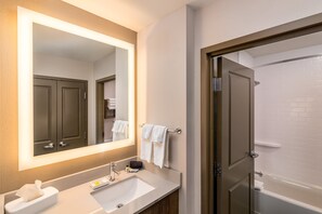 Designer toiletries, hair dryer, towels, soap