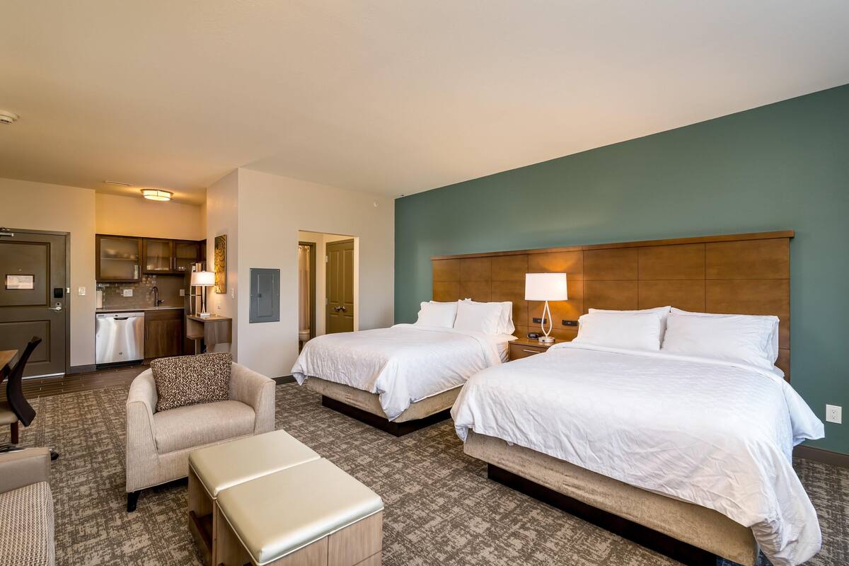 Premium bedding, down comforters, pillowtop beds, desk