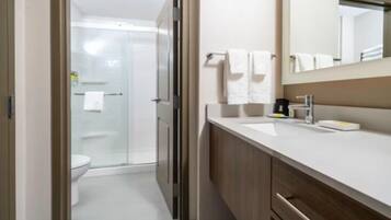 Designer toiletries, hair dryer, towels, soap