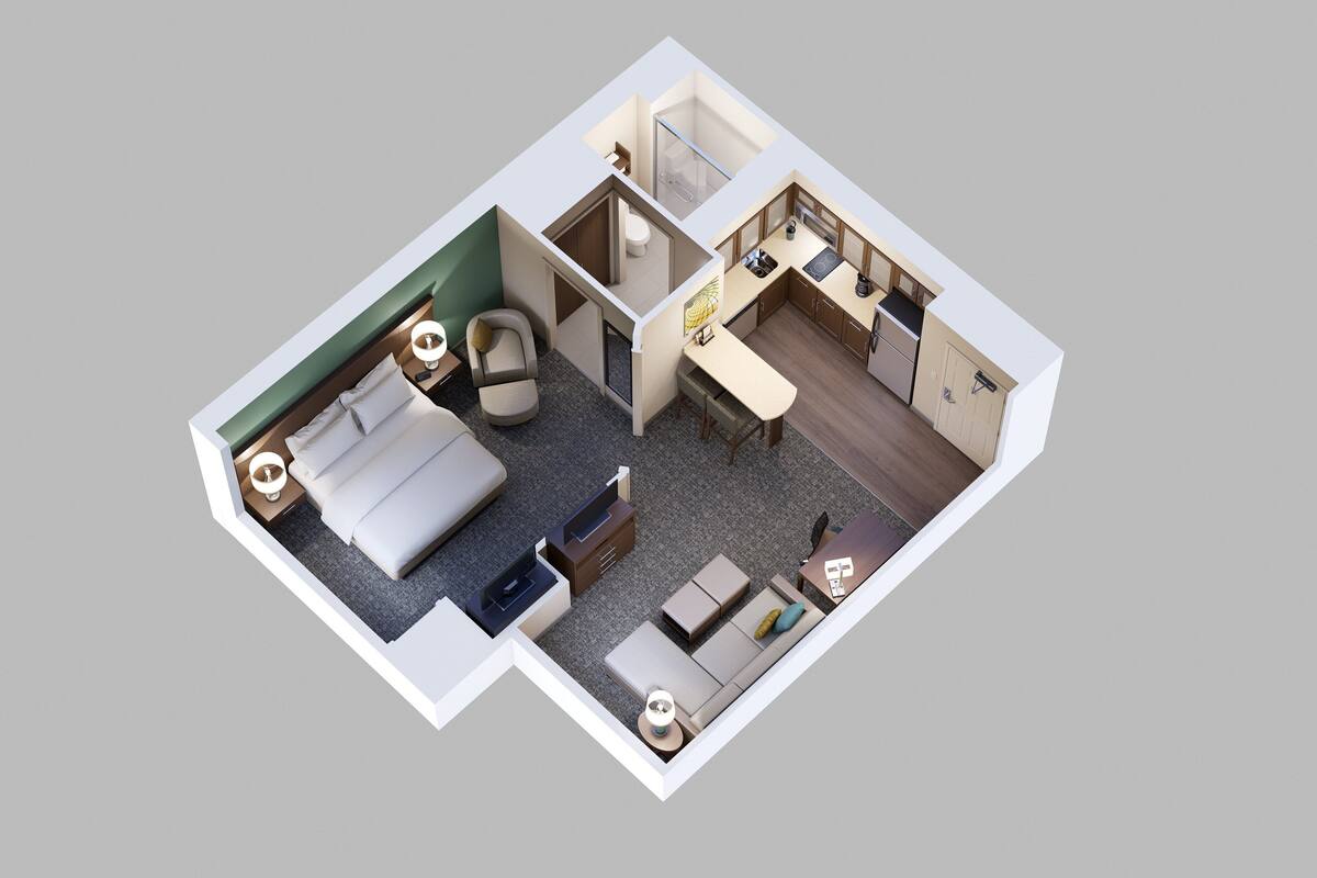 Ein 3D-Modell eines Hotelzimmers mit Bett, Sitzecke, Küchenzeile und Bad.
