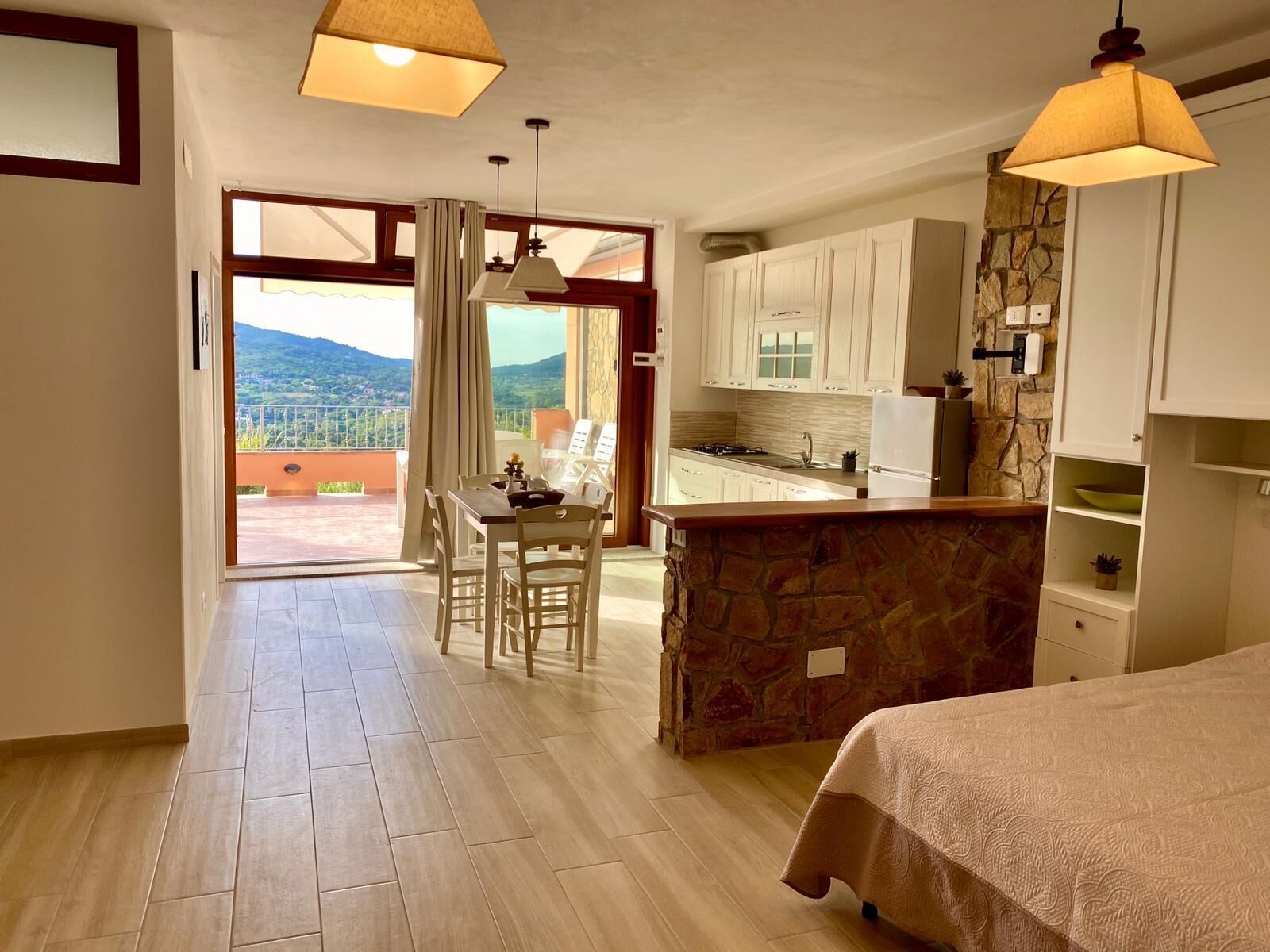 Estúdio luxo, 1 quarto, cozinha americana, vista para o mar (Villetta Zuccale 4) | Área de estar | TV de tela plana