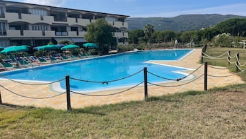Outdoor pool, pool umbrellas, pool loungers