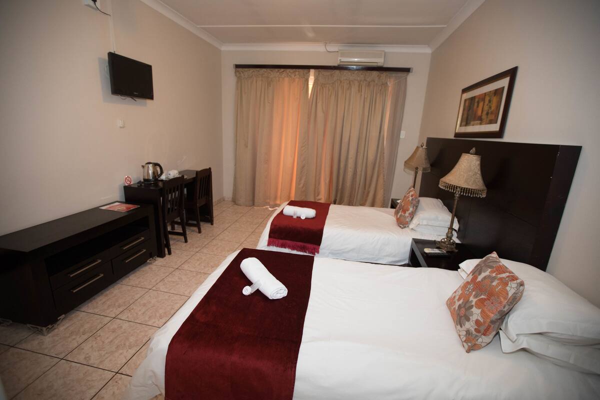 Twin Room | In-room safe, desk, laptop workspace, iron/ironing board