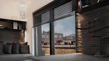 City Studio (25m2) | Living area | Flat-screen TV