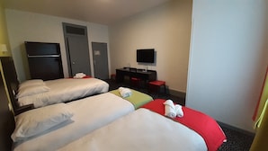 A hotel room with two beds, a desk, a television, and two doors. - Enzo Hotels Contrexéville (Contrexéville)