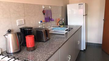 Apartment | Private kitchen | Fridge, microwave, stovetop, coffee/tea maker